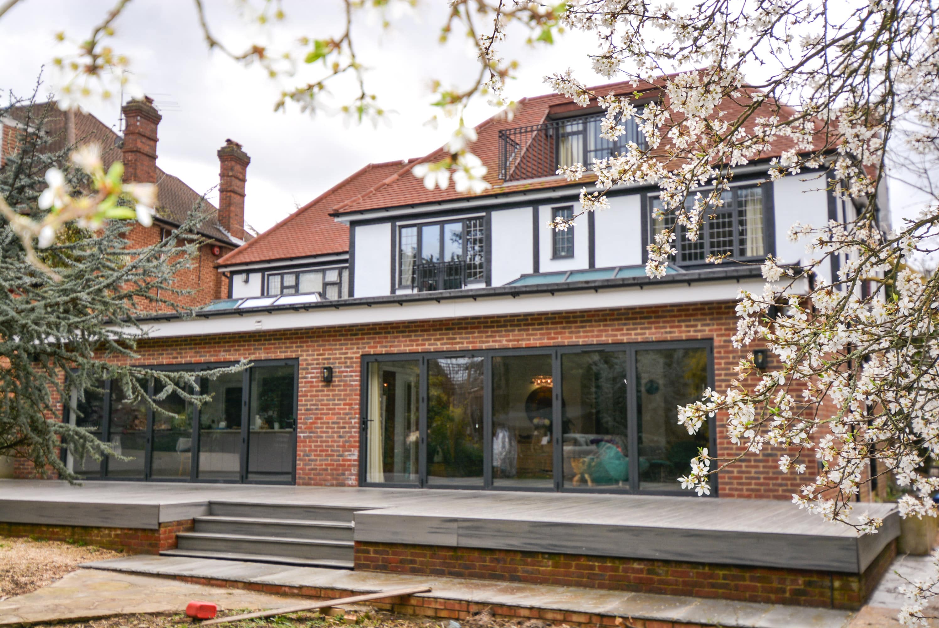 The back of a house with a new modern extension still being renovated to increase the market value of the property